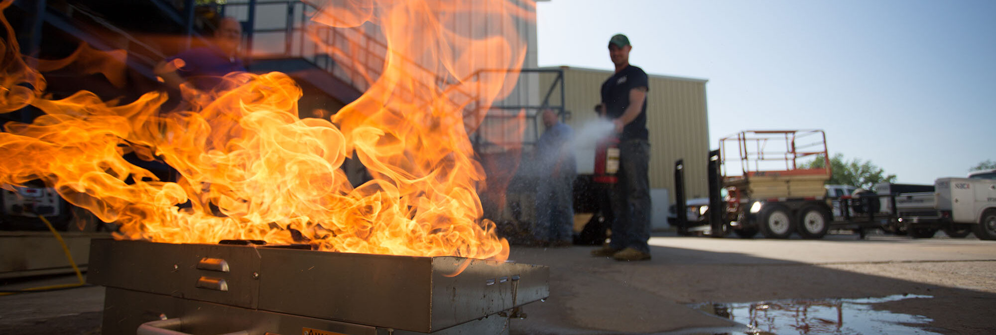 firefighter putting out training fire