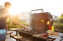 man grilling outside
